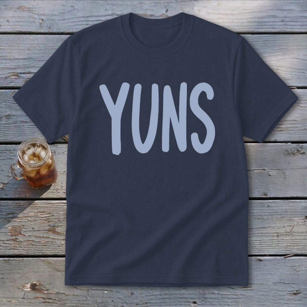Navy t-shirt with light blue "YUNS" text and a mug of iced tea.