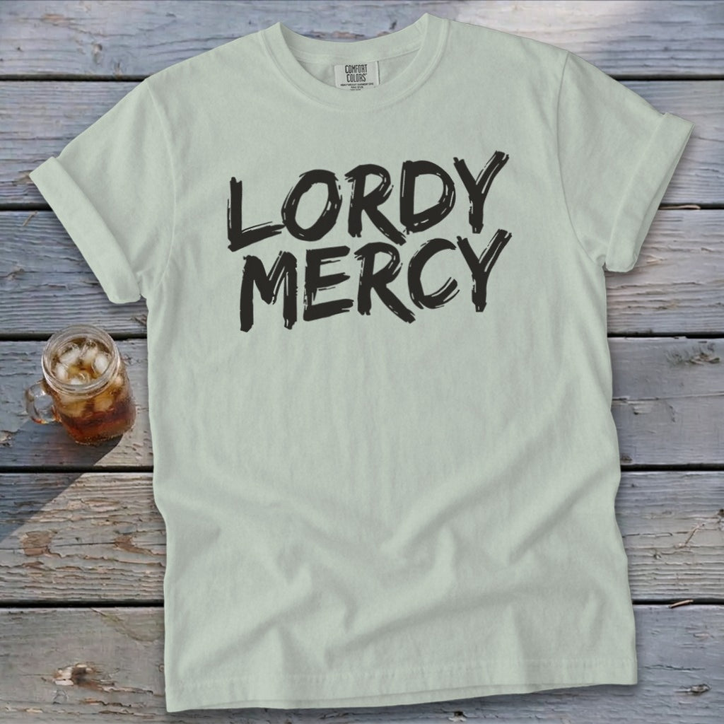 Light mint green t-shirt with "LORDY MERCY" printed in black brushstroke font.