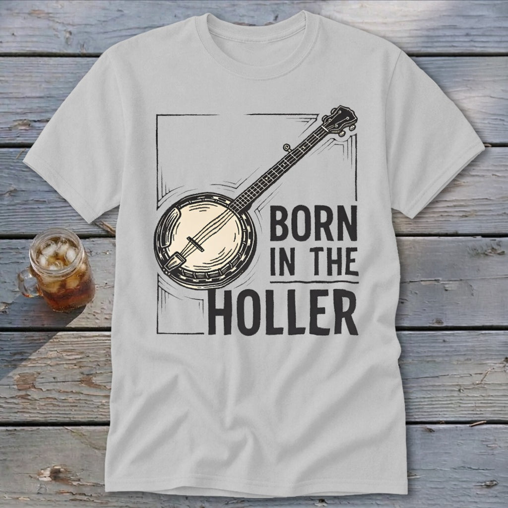 White t-shirt with banjo graphic and text "BORN IN THE HOLLER".