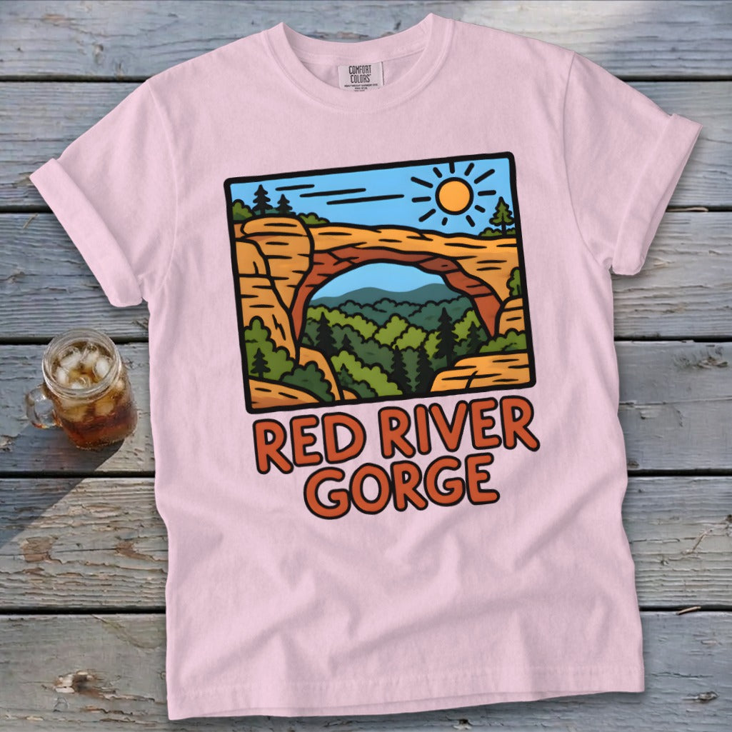 Pink t-shirt with "Red River Gorge" text and scenic arch graphic.