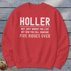 Red sweatshirt with white text: "HOLLER, NOT JUST WHERE YOU LIVE BUT HOW YOU CALL SOMEONE FIVE RIDGES OVER."