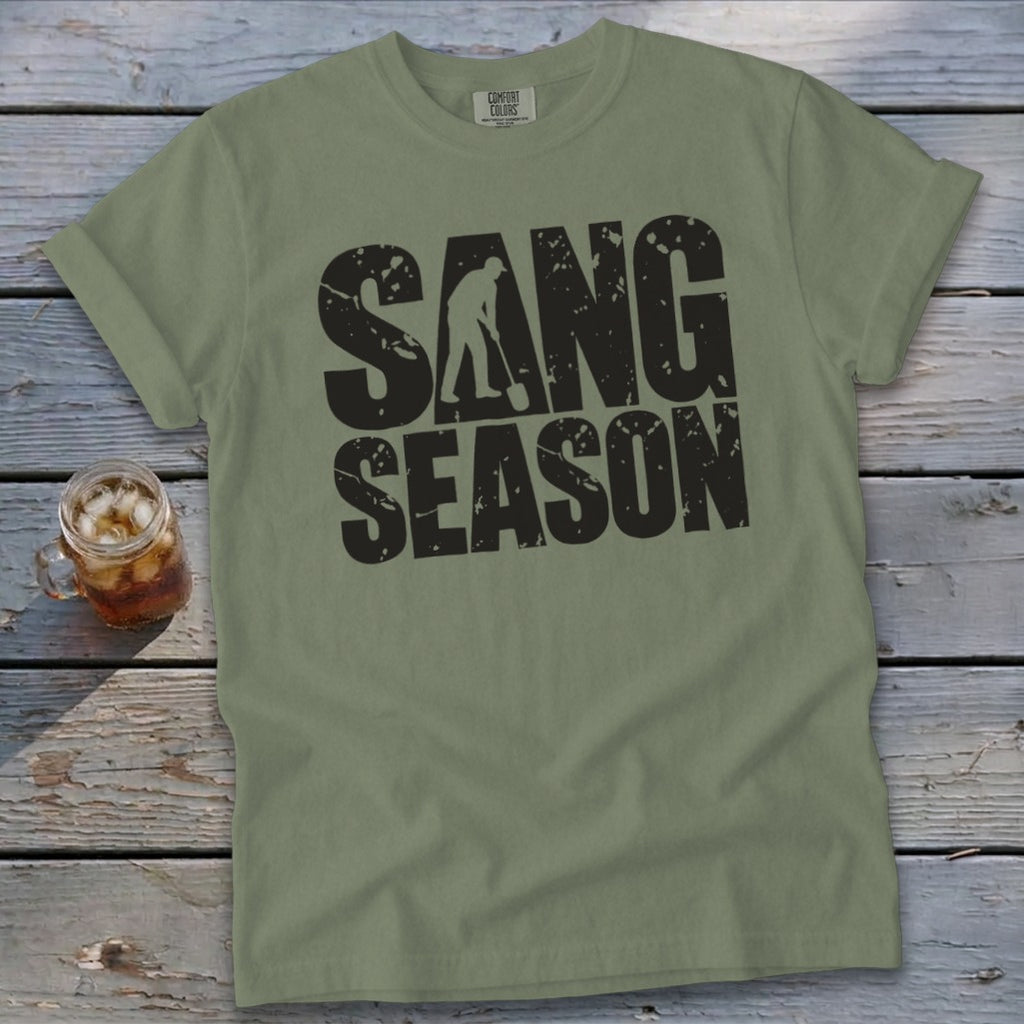 Olive green t-shirt with rolled sleeves featuring distressed black text that reads SANG SEASON.