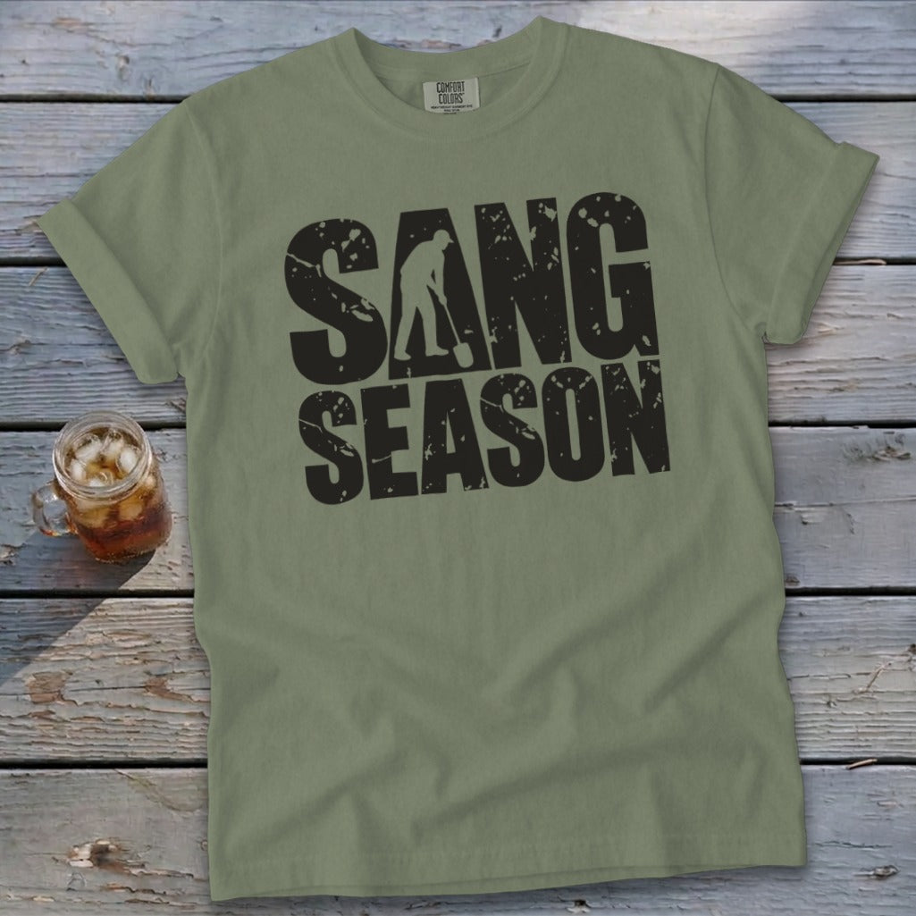 Olive green t-shirt with rolled sleeves featuring distressed black text that reads SANG SEASON.