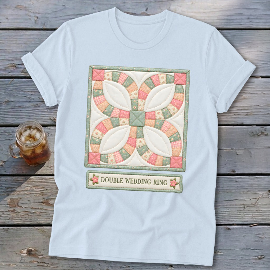 Light blue t-shirt with a Double Wedding Ring quilt design and text.