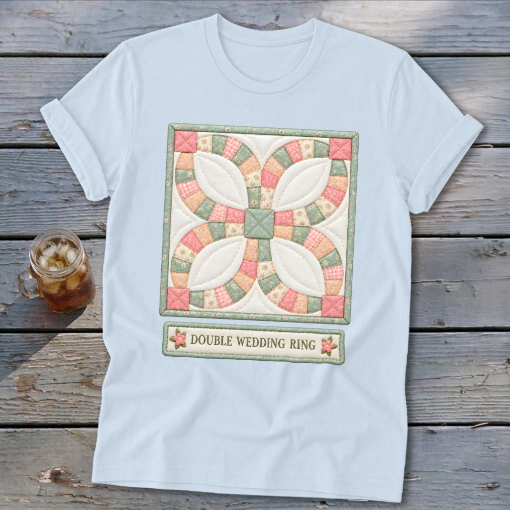 Light blue t-shirt with a Double Wedding Ring quilt design and text.