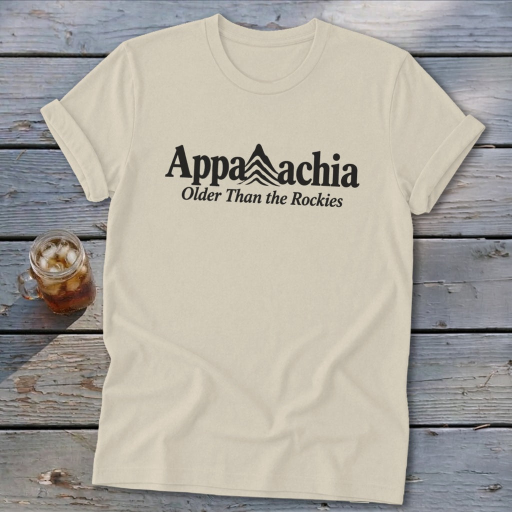 Cream t-shirt with black text "Appalachia Older Than the Rockies" and mountain graphic.