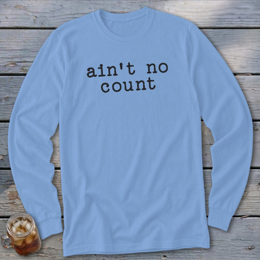 Light blue long-sleeved shirt with black text "ain't no count"