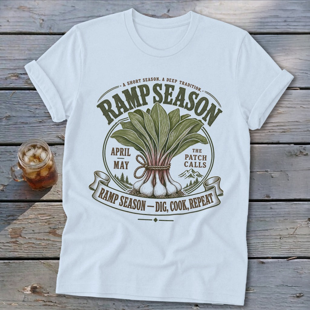 White t-shirt with "Ramp Season" graphic featuring ramps and text about digging, cooking, and repeating.