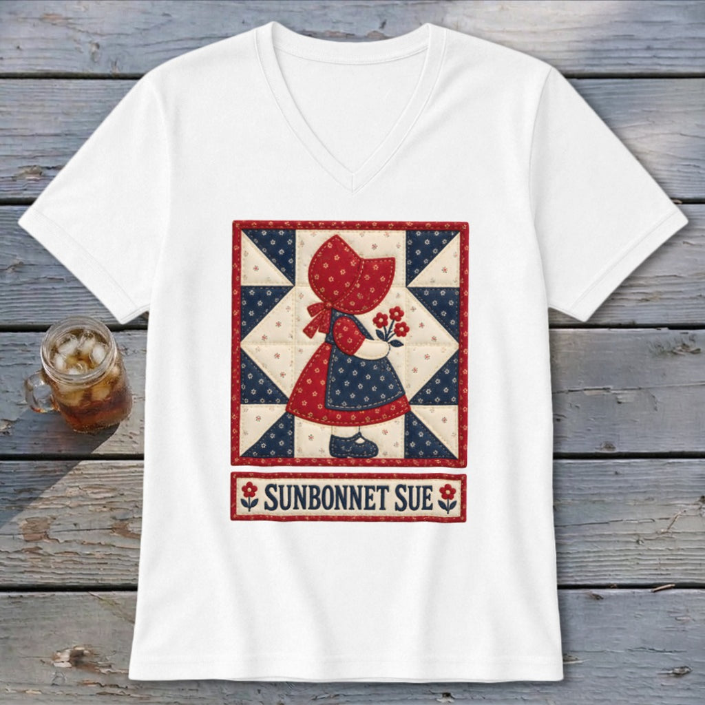 White t-shirt with Sunbonnet Sue quilt design and text below.