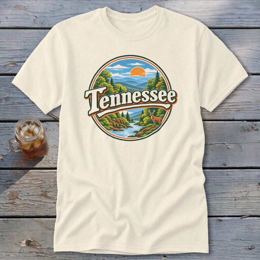 Cream t-shirt with circular graphic of Tennessee landscape, river, and deer.