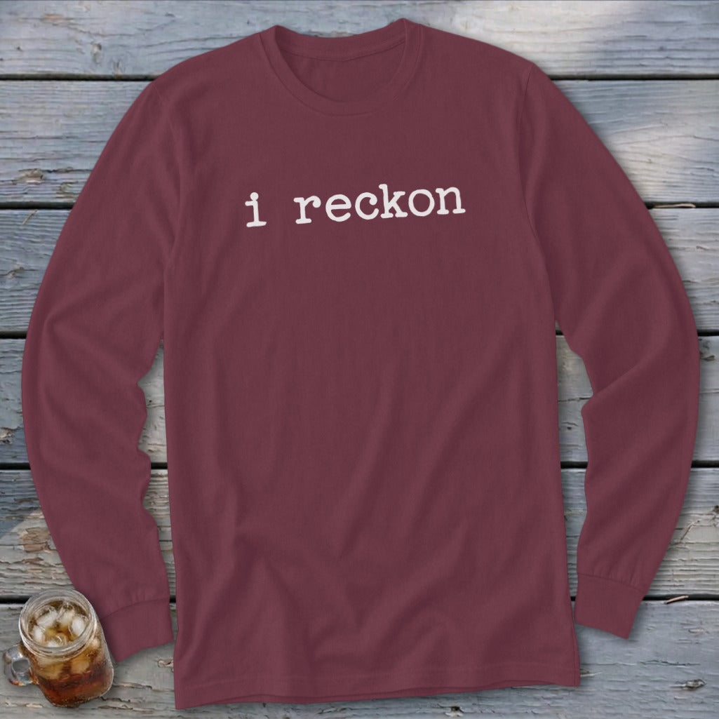 Maroon long sleeve shirt with white text "i reckon" on chest.