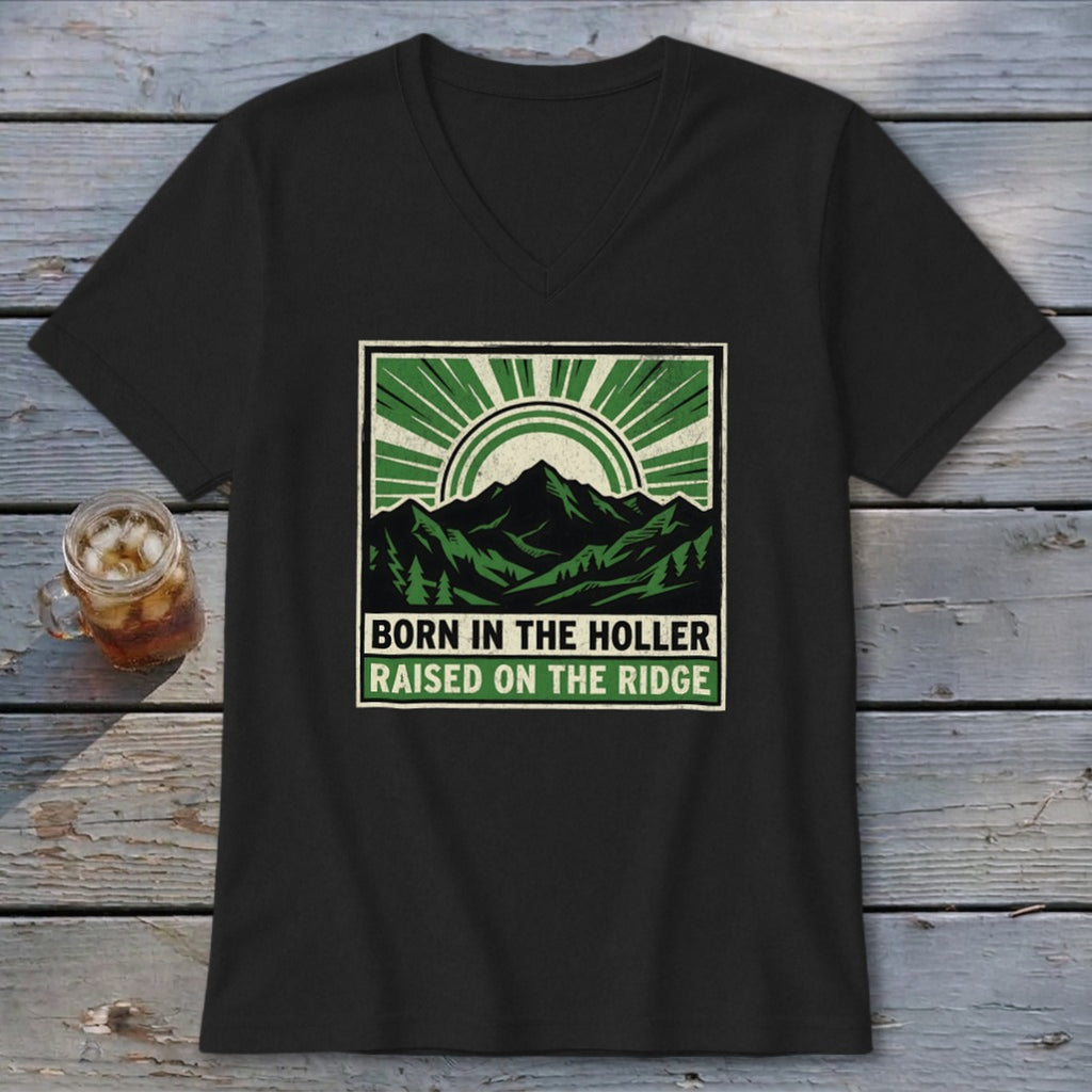 Black V-neck t-shirt with a green and white mountain graphic and text reading Born in the Holler Raised on the Ridge.