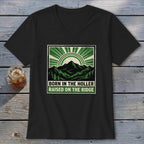 Black V-neck t-shirt with a green and white mountain graphic and text reading Born in the Holler Raised on the Ridge.