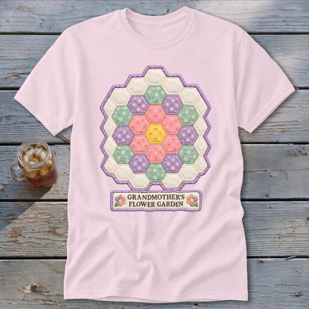 Pink t-shirt with a hexagonal quilt design and "GRANDMOTHER'S FLOWER GARDEN" text.