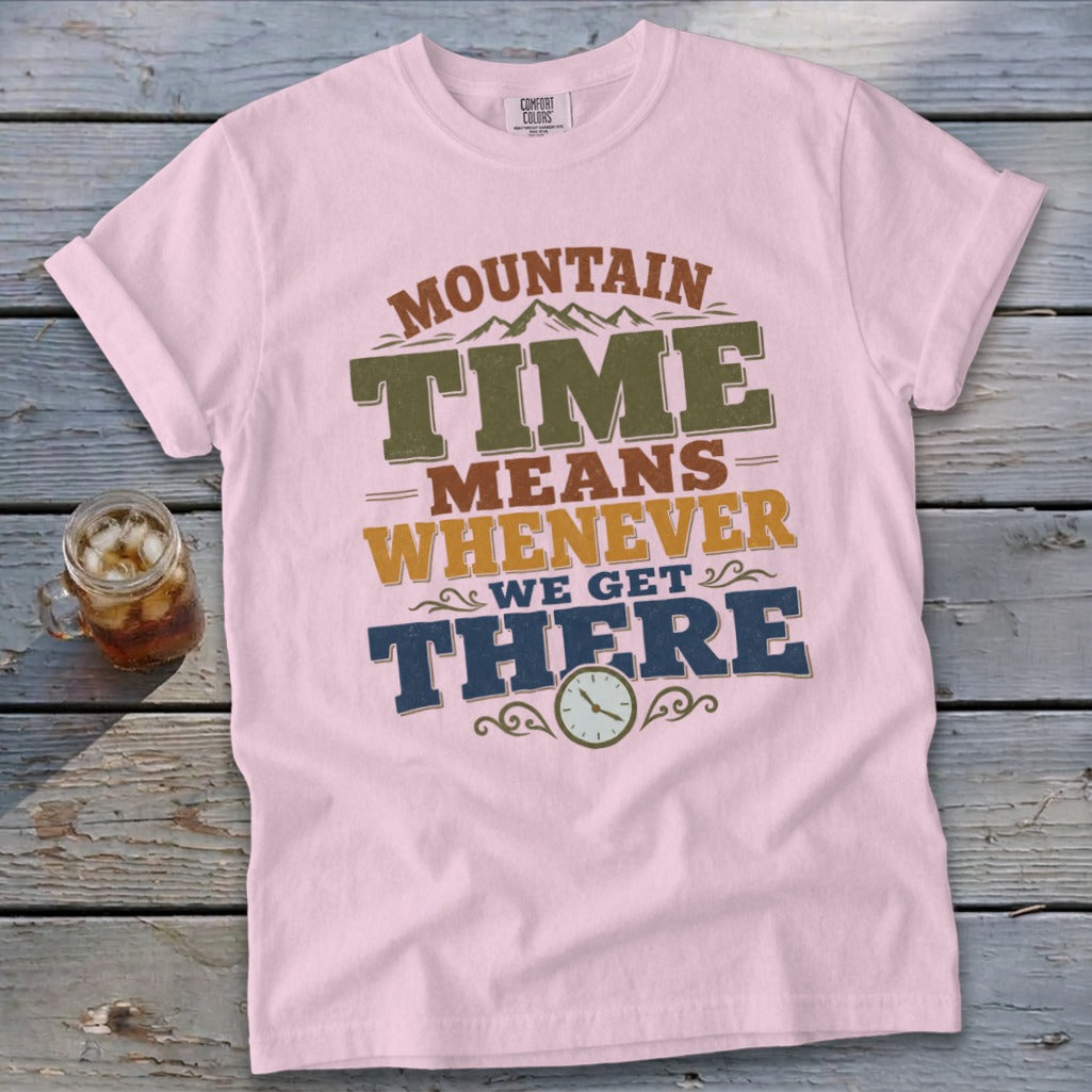 Pink t-shirt with "Mountain Time Means Whenever We Get There" text and clock graphic.