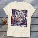 Cream t-shirt with a ghost in a dark forest graphic and text "The Haints Ain't Left".