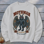 White sweatshirt with Mothman graphic saying "Mothman Was My Neighbor".