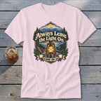 Pink t-shirt with "Always Leave the Light On Come On In" graphic and a lantern.