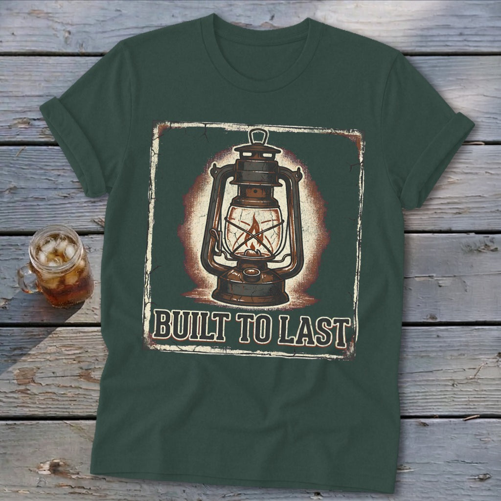 Dark green t-shirt with a vintage lantern graphic and "BUILT TO LAST" text.
