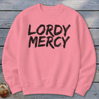 Pink crewneck sweatshirt with black "LORDY MERCY" text.