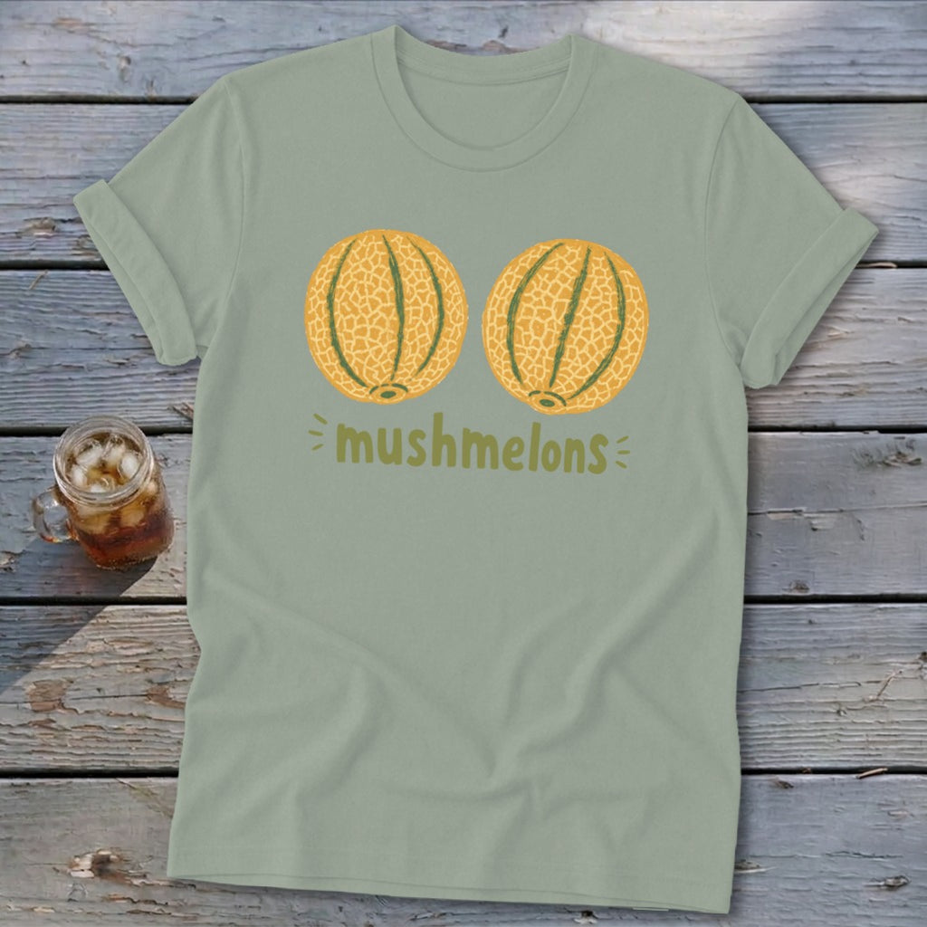 Light green t-shirt with two cantaloupes and the text "mushmelons".