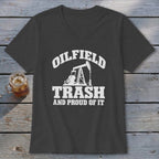 Dark gray t-shirt with white text and oil pump graphic: "OILFIELD TRASH AND PROUD OF IT".