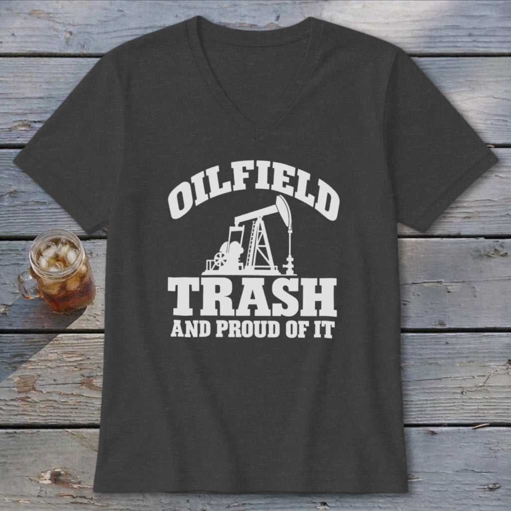 Dark gray t-shirt with white text and oil pump graphic: "OILFIELD TRASH AND PROUD OF IT".