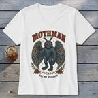 White t-shirt with Mothman graphic and text "MOTHMAN WAS MY NEIGHBOR".