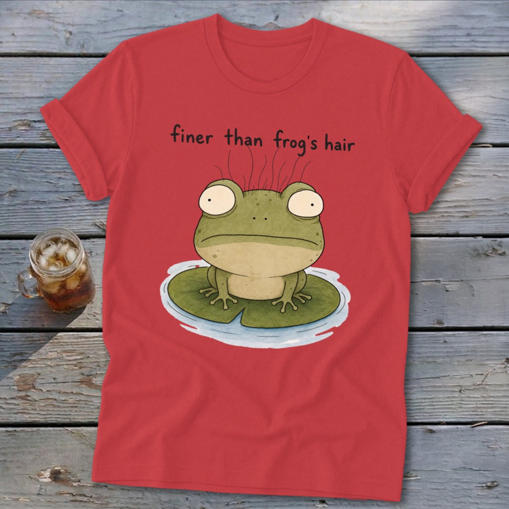 Red t-shirt featuring a cartoon frog on a lily pad with the text finer than frog's hair.