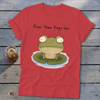 Red t-shirt featuring a cartoon frog on a lily pad with the text finer than frog's hair.