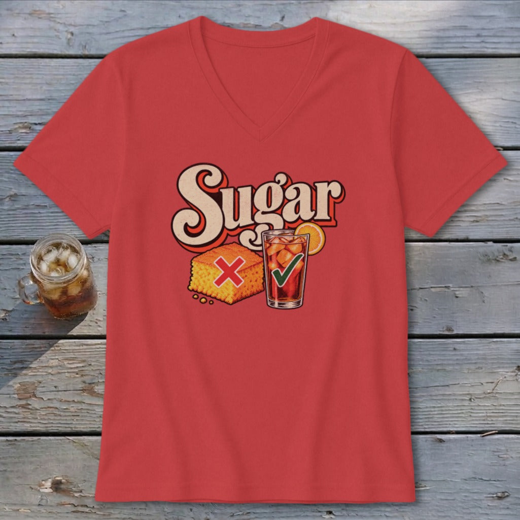 Red V-neck t-shirt featuring a retro graphic with the text Sugar, a cornbread piece with a red X, and an iced tea with a green checkmark.