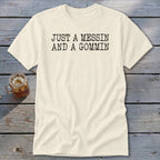 Cream t-shirt with black text reading "JUST A MESSIN AND A GOMMIN".