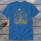 Blue t-shirt with orange mountain graphic and "If you hear whistlin', keep hiking." text.