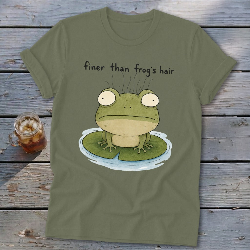 Olive green t-shirt featuring a cartoon frog on a lily pad with the text finer than frog's hair.