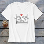 White t-shirt with a line drawing of a couple and dog on a swing with a red heart above.