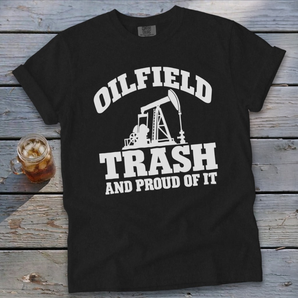 Black t-shirt with white text and an oil rig graphic: "Oilfield Trash And Proud Of It".