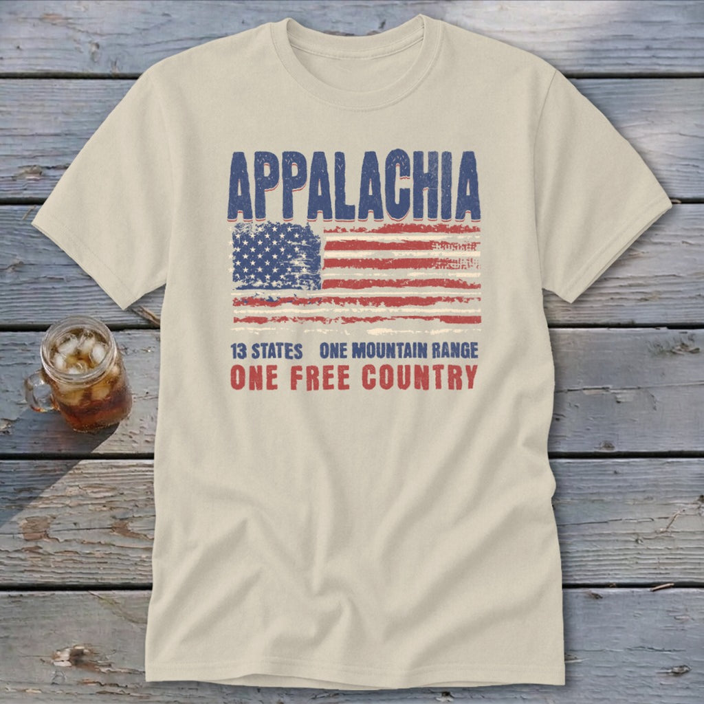 A beige t-shirt with distressed American flag graphics and text reading Appalachia, 13 States, One Free Country.