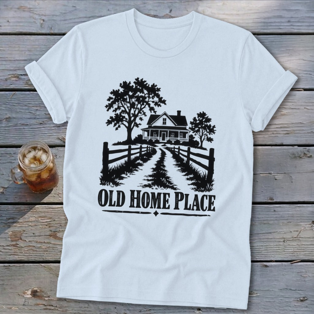 White t-shirt with a graphic of a farmhouse, trees, and the text "OLD HOME PLACE."