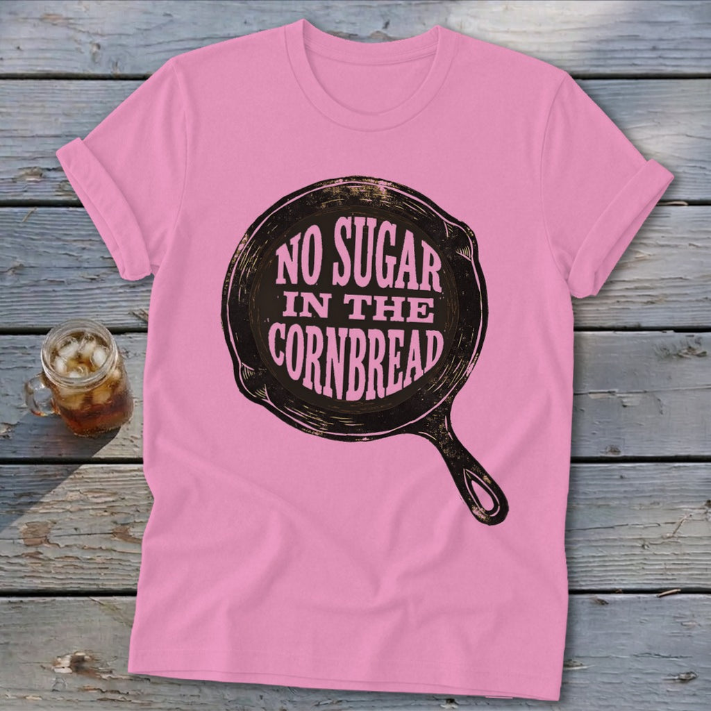 Pink t-shirt with "No Sugar in the Cornbread" text inside a cast iron skillet graphic.
