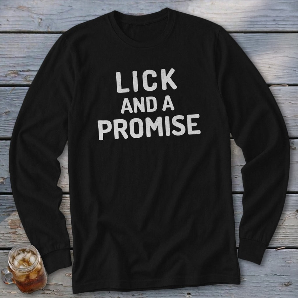 Black long-sleeve shirt with white text reading "LICK AND A PROMISE".