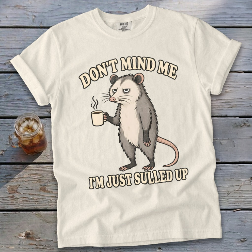 Cream t-shirt with possum graphic and text "DON'T MIND ME I'M JUST SULLED UP".