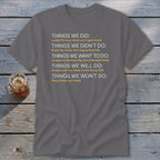 Gray t-shirt with yellow text listing "Things We Did", "Things We Didn't Do", "Things We Want To Do", "Things We Will Do", and "Things We Won't Do".