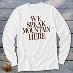 White long sleeve shirt with "WE SPEAK MOUNTAIN HERE" text in brown.