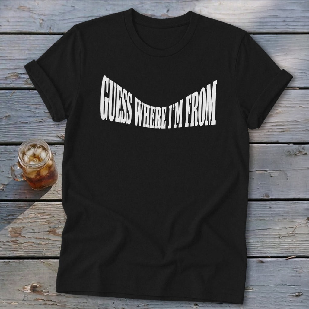 Black t-shirt with white text that reads "GUESS WHERE I'M FROM".