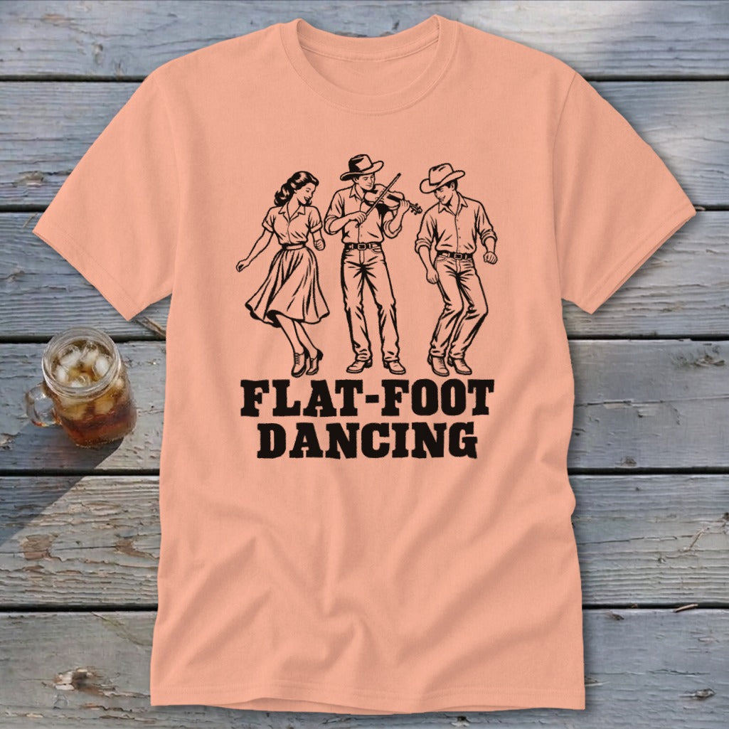 Peach t-shirt with black illustration of three people flat-foot dancing and text.