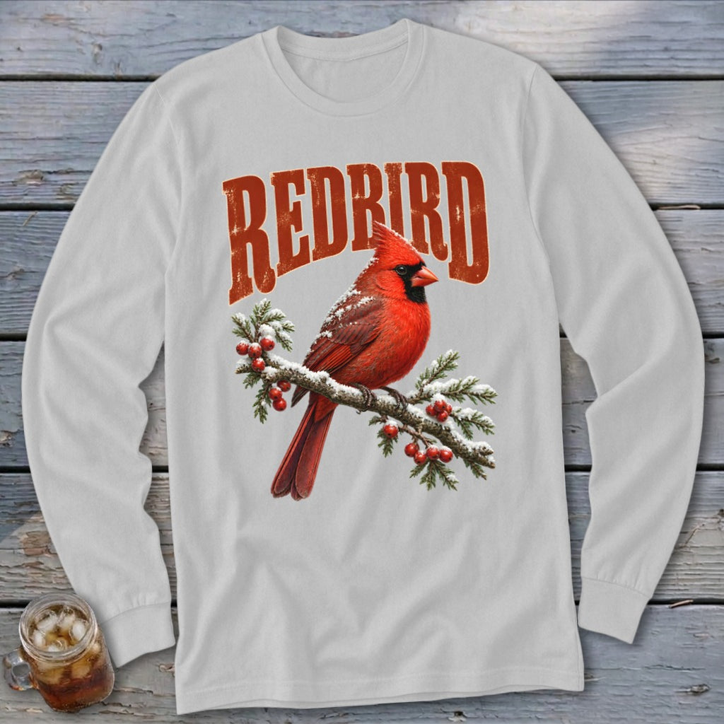 Light gray long-sleeve t-shirt featuring a red cardinal on a snowy branch with the text REDBIRD.
