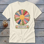 Cream t-shirt with a colorful Dresden Plate quilt design and "DRESDEN PLATE" text.