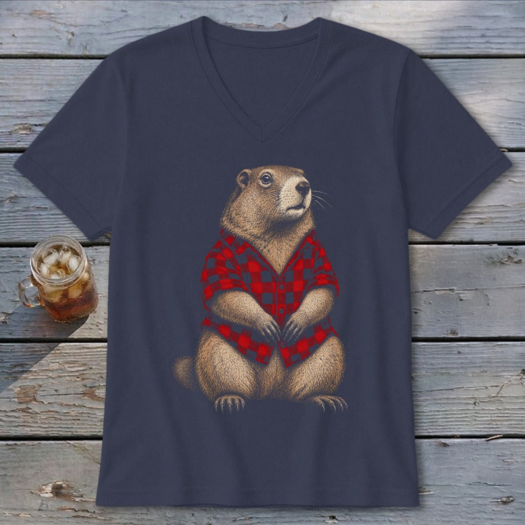 Groundhog wearing a red and black plaid shirt on a navy v-neck t-shirt.