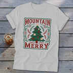 A light gray t-shirt with a vintage Christmas tree design and the text Mountain Merry.