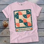Pink t-shirt with quilt design and "Drunkard's Path" text.